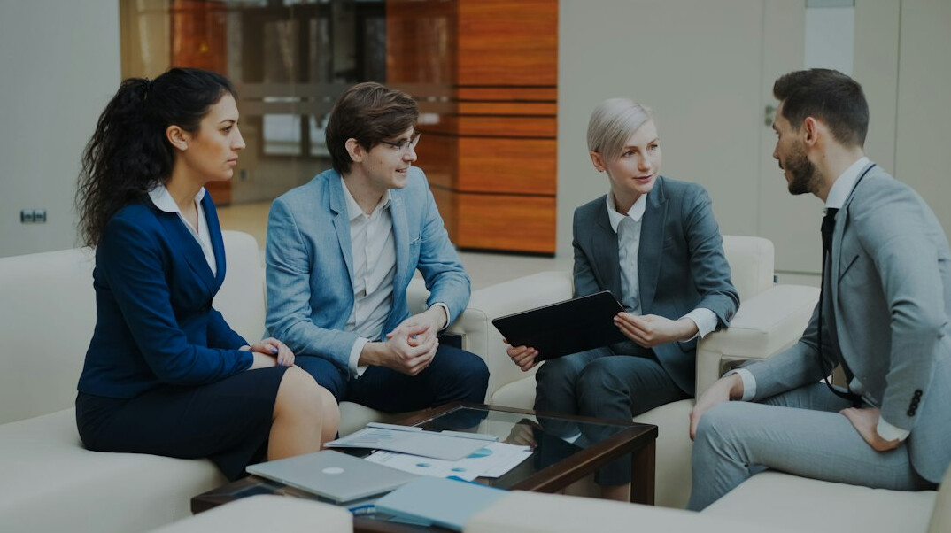 corporate team meeting with documents
